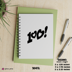 Spiral-bound notebook with '100!' on a light surface with pens and a plant.