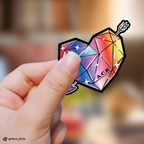 Hand holding a colorful gemstone-shaped sticker with 'A.C.E.' branding against a blurred background.