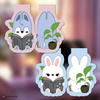 Bang chan and Lee know bookmarks with plants and books on a blurred background
