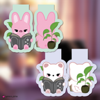 Changbin and Hyunjin bookmarks with plants on a blurred background