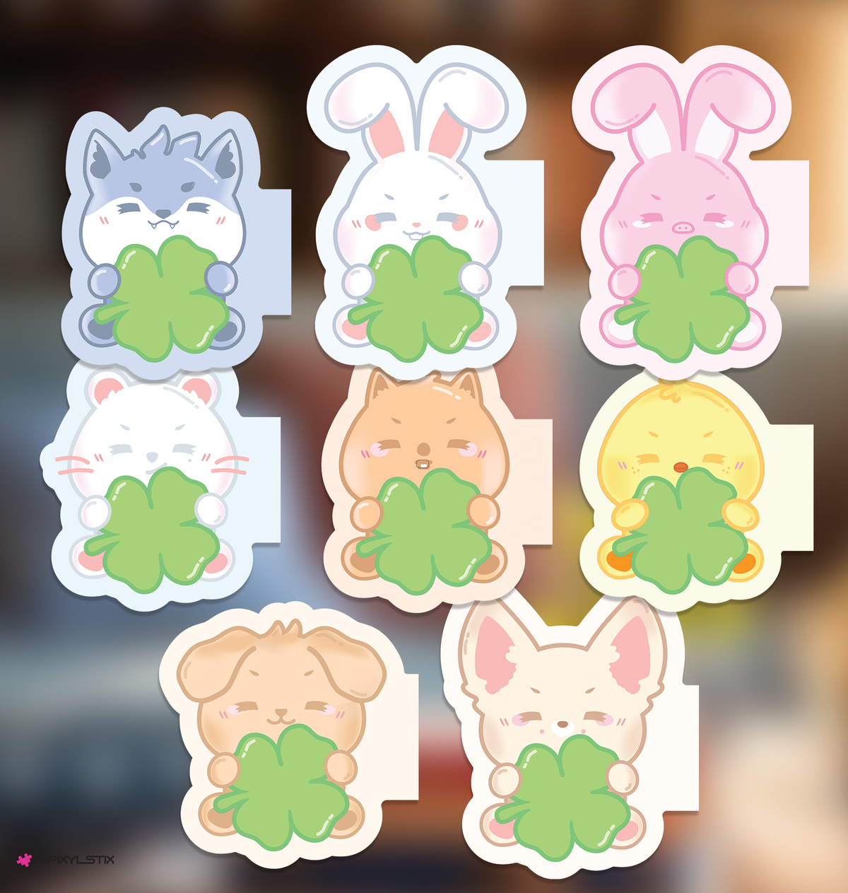 Set of skzoo bookmarks holding green clover leaves on a blurred background